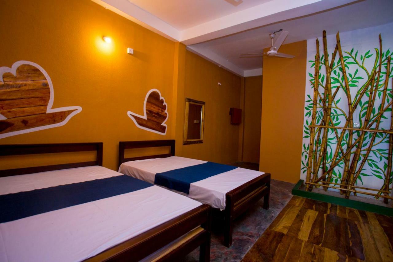 בטיקלואה Neem Garden Guest House חדר תמונה